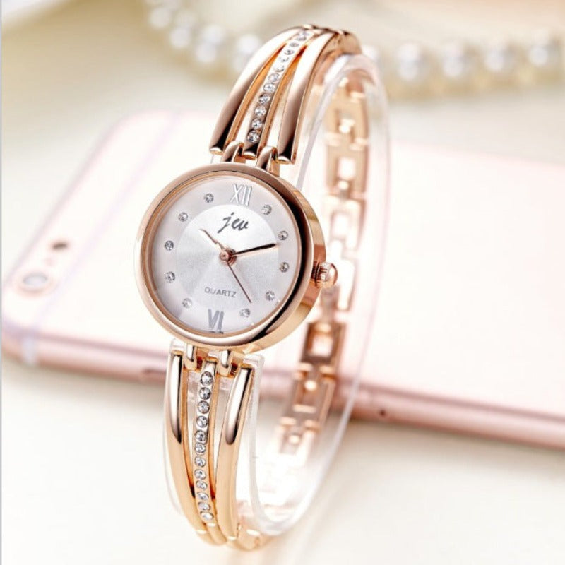 Montre ronde pour femme avec bracelet en acier et strass