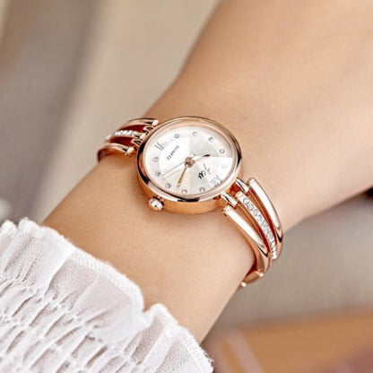 Montre ronde pour femme avec bracelet en acier et strass