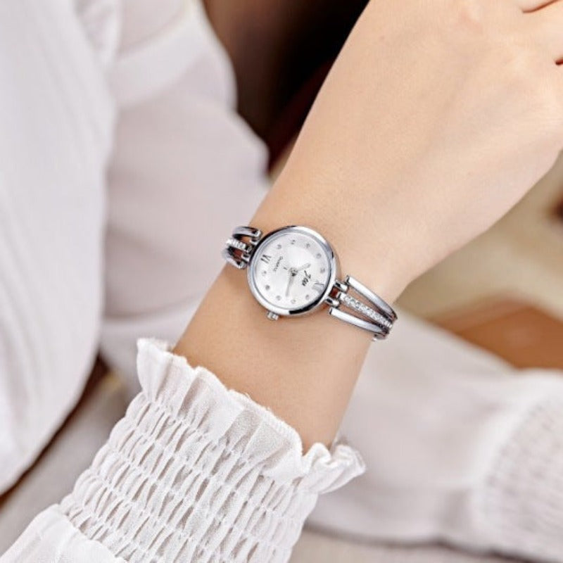 Montre ronde pour femme avec bracelet en acier et strass