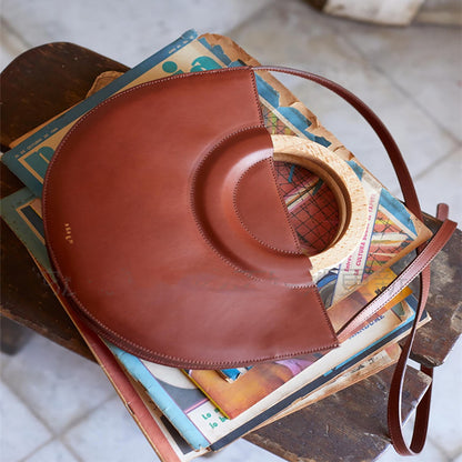 Bolso abanico con mango de madera