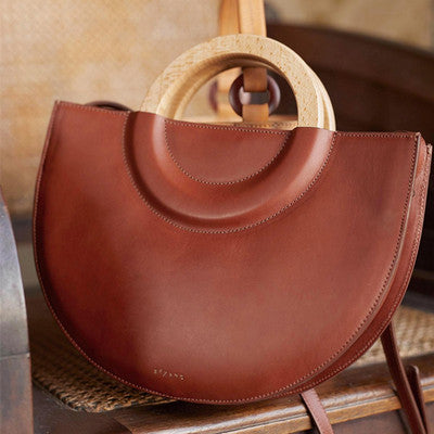 Bolso abanico con mango de madera