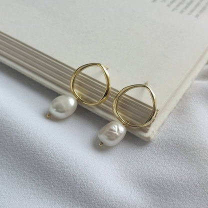 Boucles d'oreilles pendantes avec perles