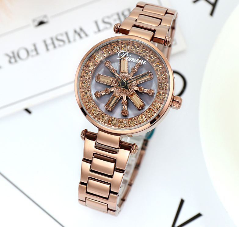 Montre avec ceinture en acier et strass